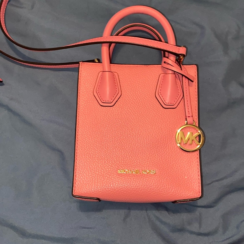 Michael KorsSmall pink crossbody 7 in by 6 inch across the bottom